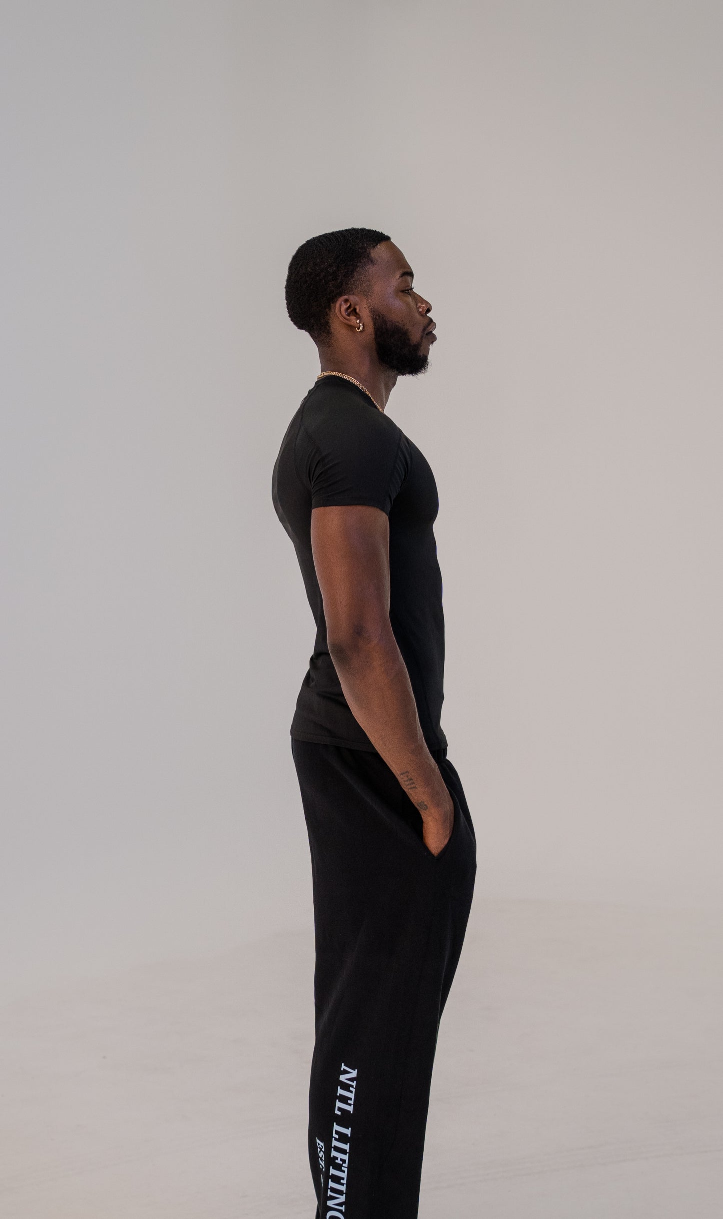 ESSENTIALS COMPRESSION SHORT SLEEVE