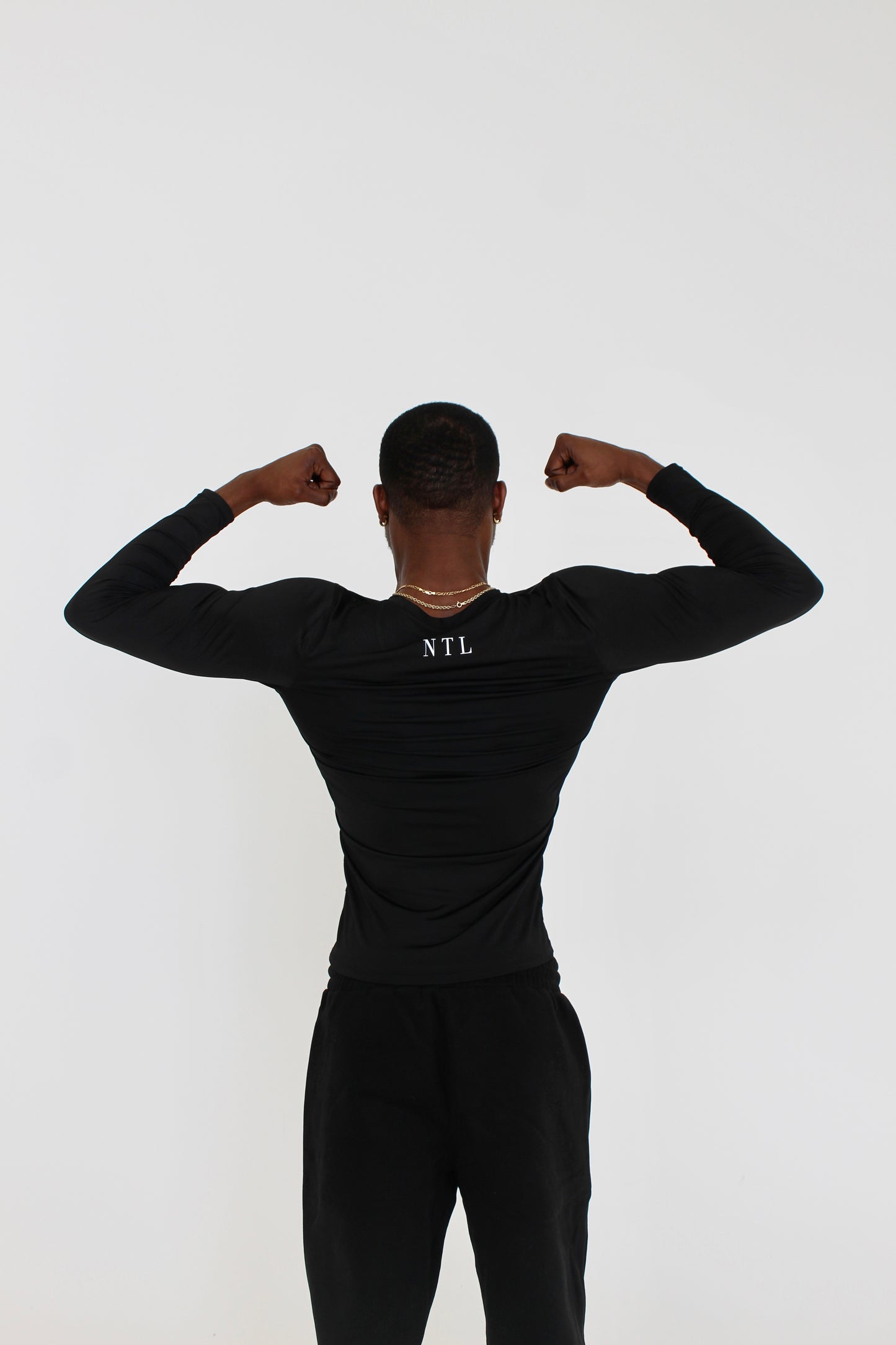 ESSENTIALS COMPRESSION TEE