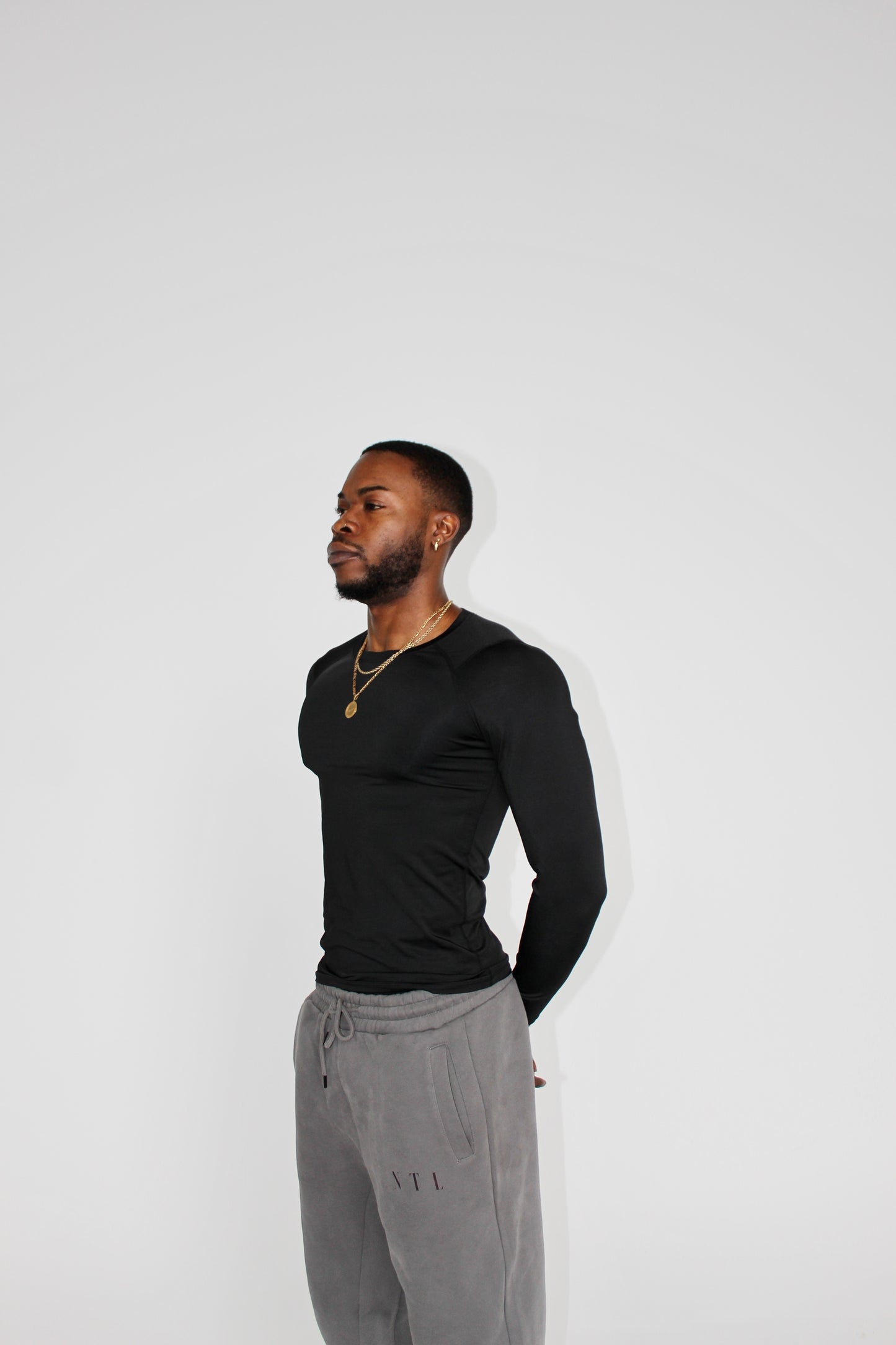 ESSENTIALS COMPRESSION TEE